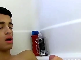 Cute young twink toying and jerking off during hot bath